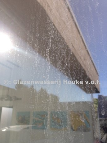 Cementsluier op glas Cementsluier op glas